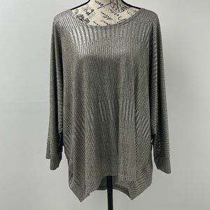 In almost brand new condition Woman’s Kim & Cami top. Size is 3X.